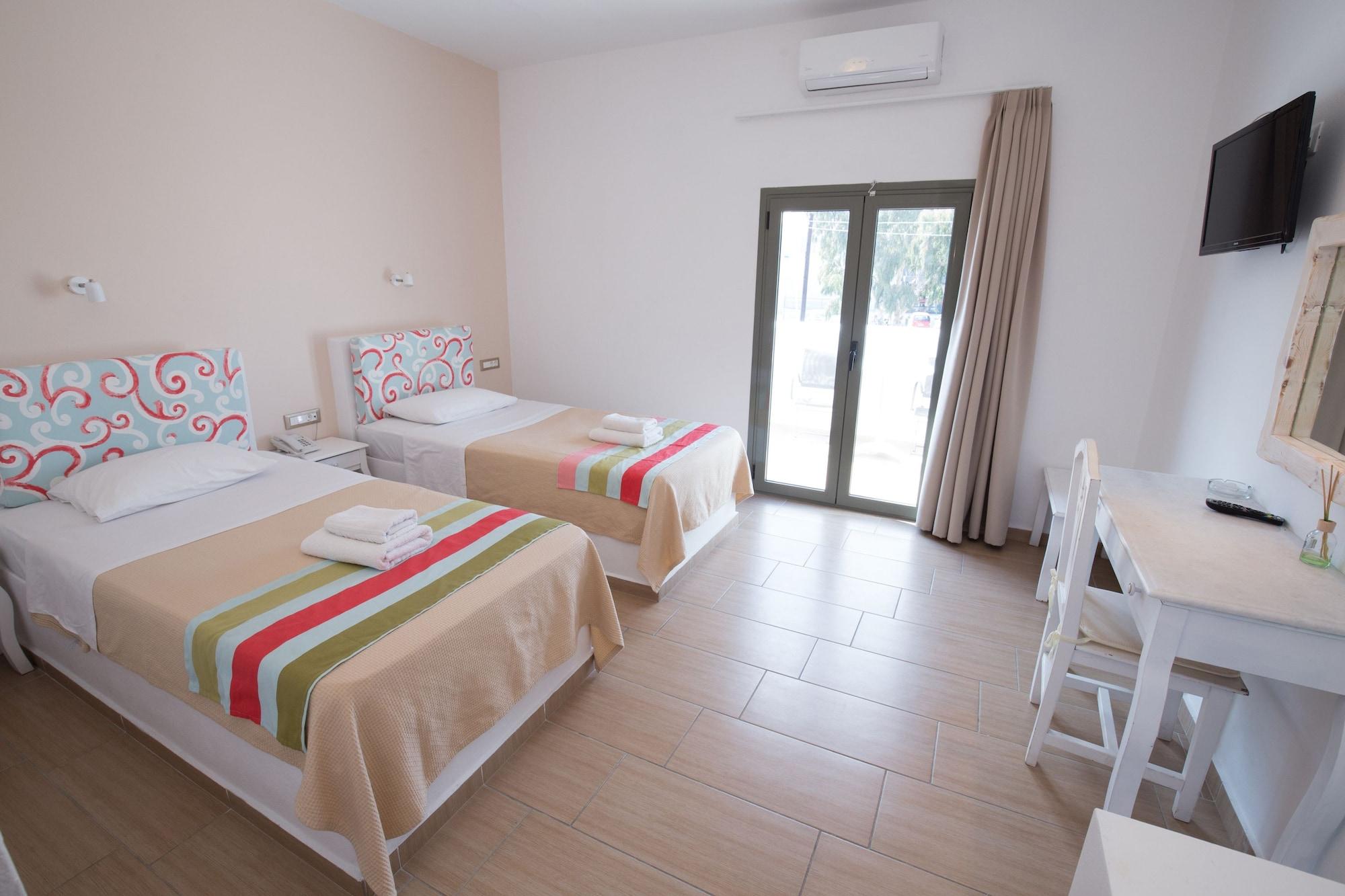 Omiros Hotel Мессария Экстерьер фото