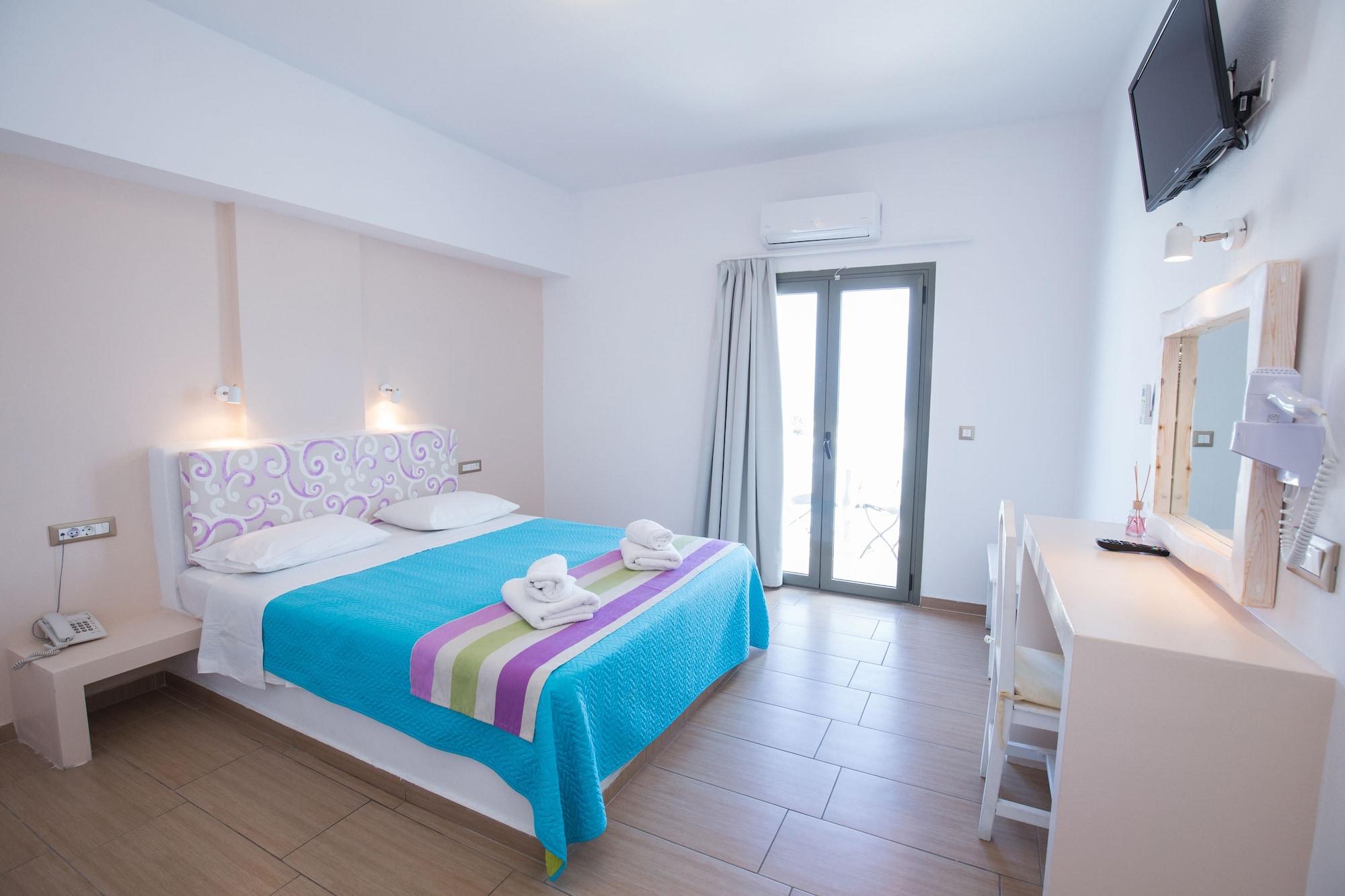 Omiros Hotel Мессария Экстерьер фото