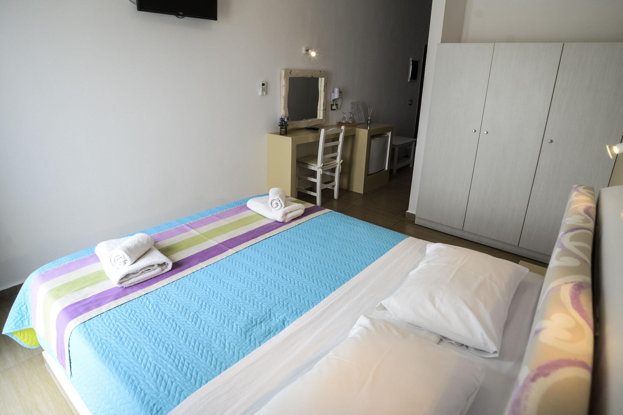 Omiros Hotel Мессария Экстерьер фото