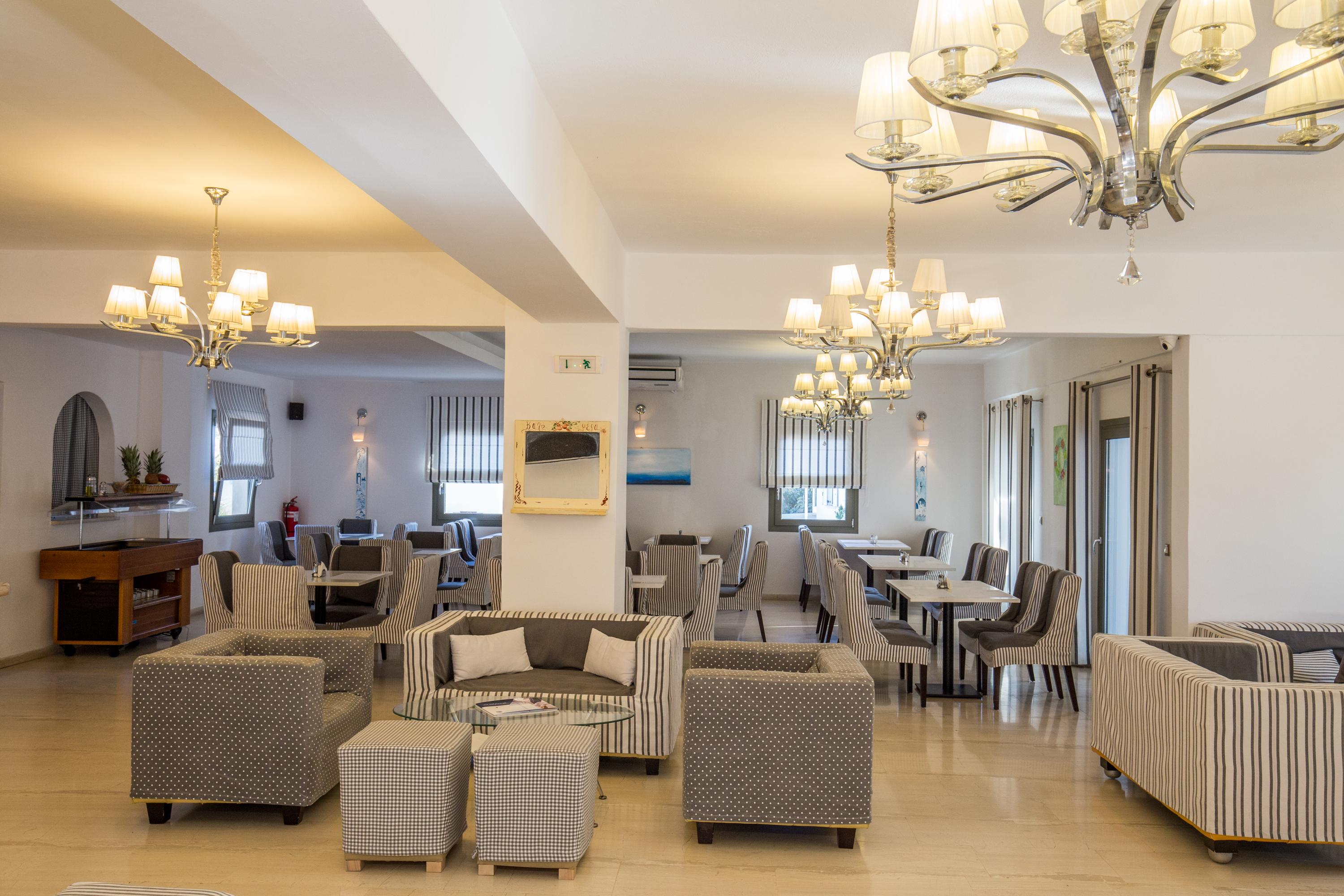 Omiros Hotel Мессария Экстерьер фото