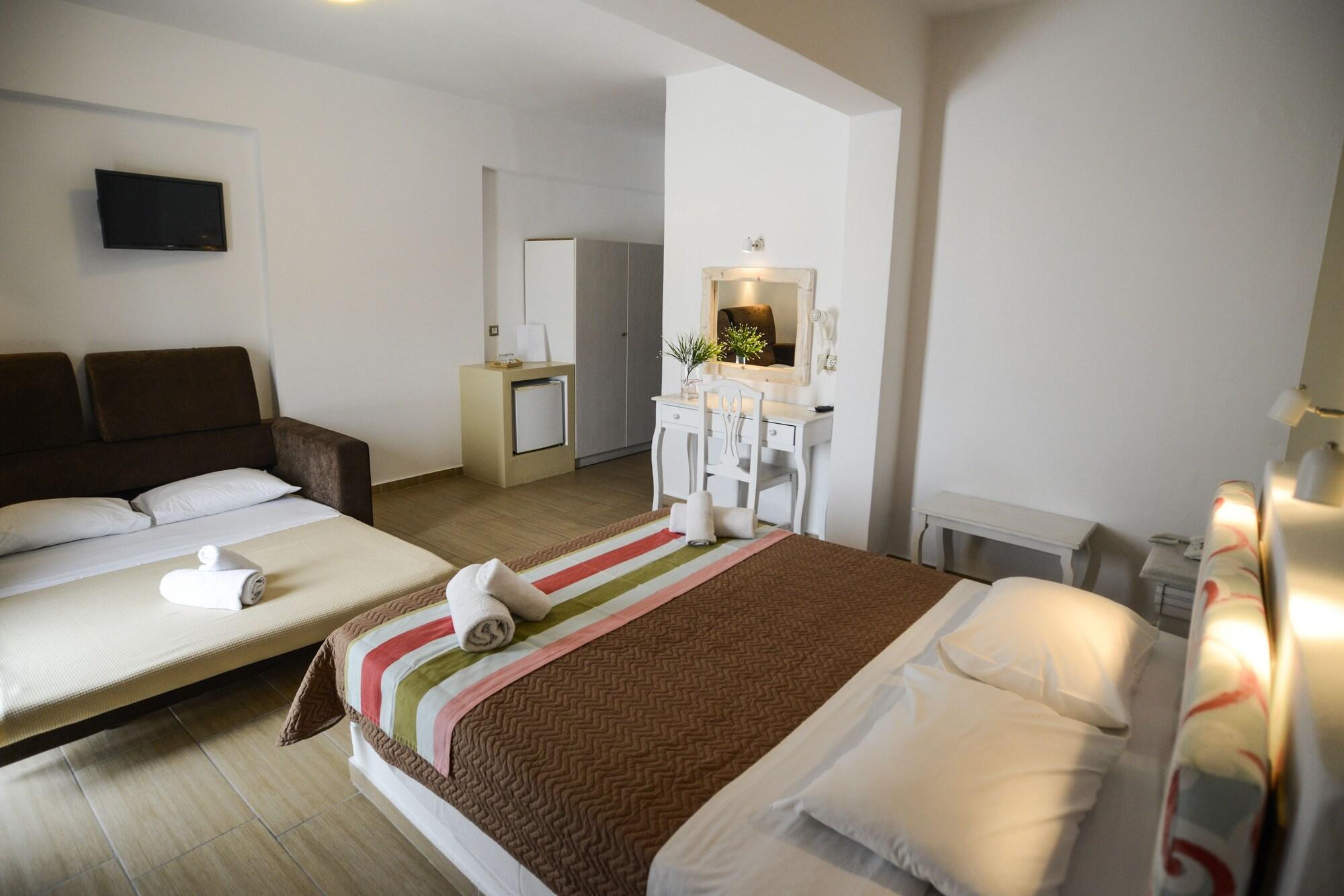 Omiros Hotel Мессария Экстерьер фото