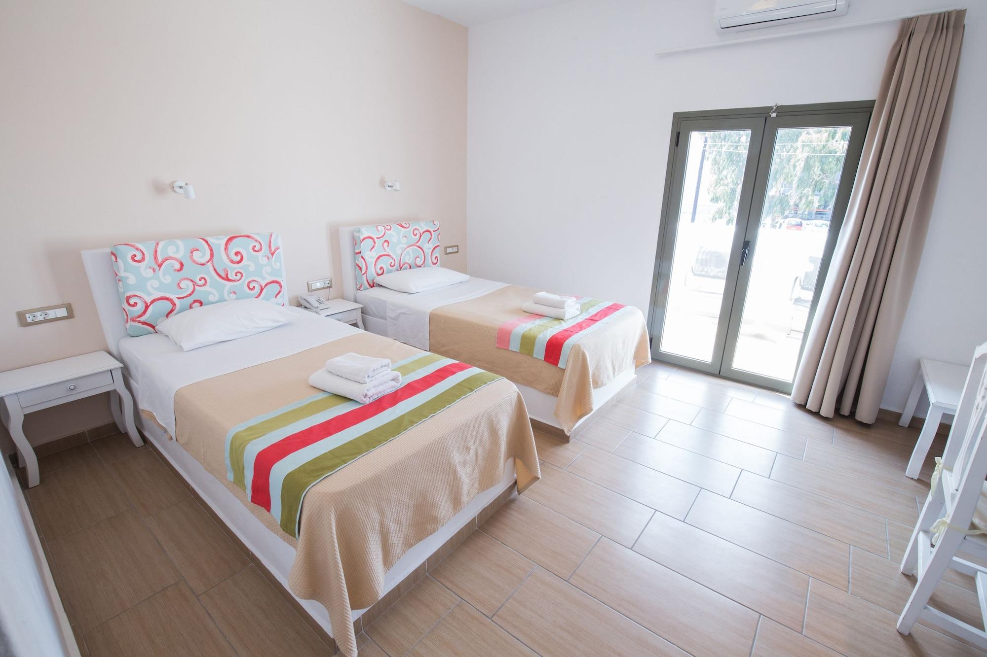 Omiros Hotel Мессария Экстерьер фото